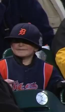 kid with giant Tigers hat